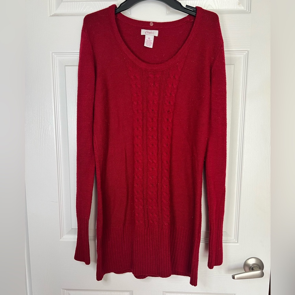 Long women’s red sweater.